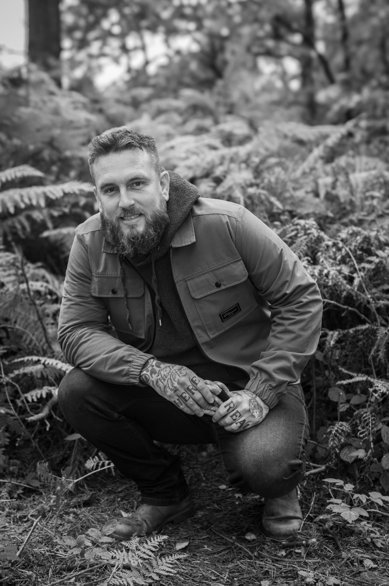 Liam Rebel, specialist realism tattoo artist, working on a detailed portrait tattoo in his Sheffield studio