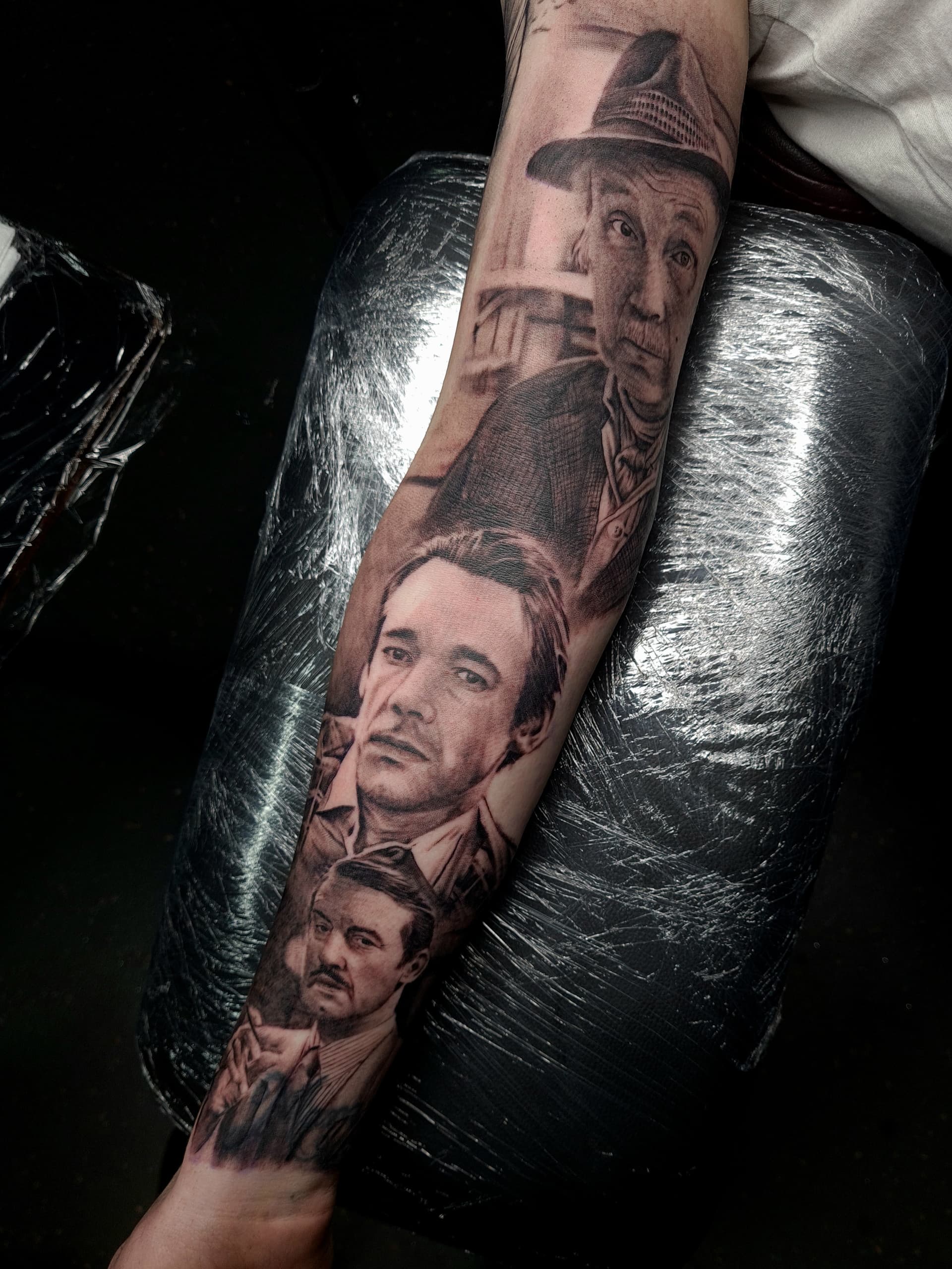 Black and grey realism tattoo of Only Fools and Horses TV characters on the forearm