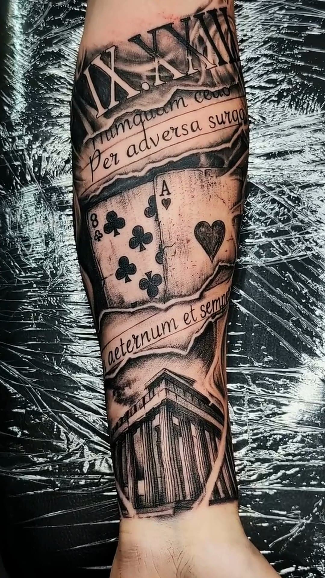 Black and grey playing card forearm tattoo, 6-hour session
