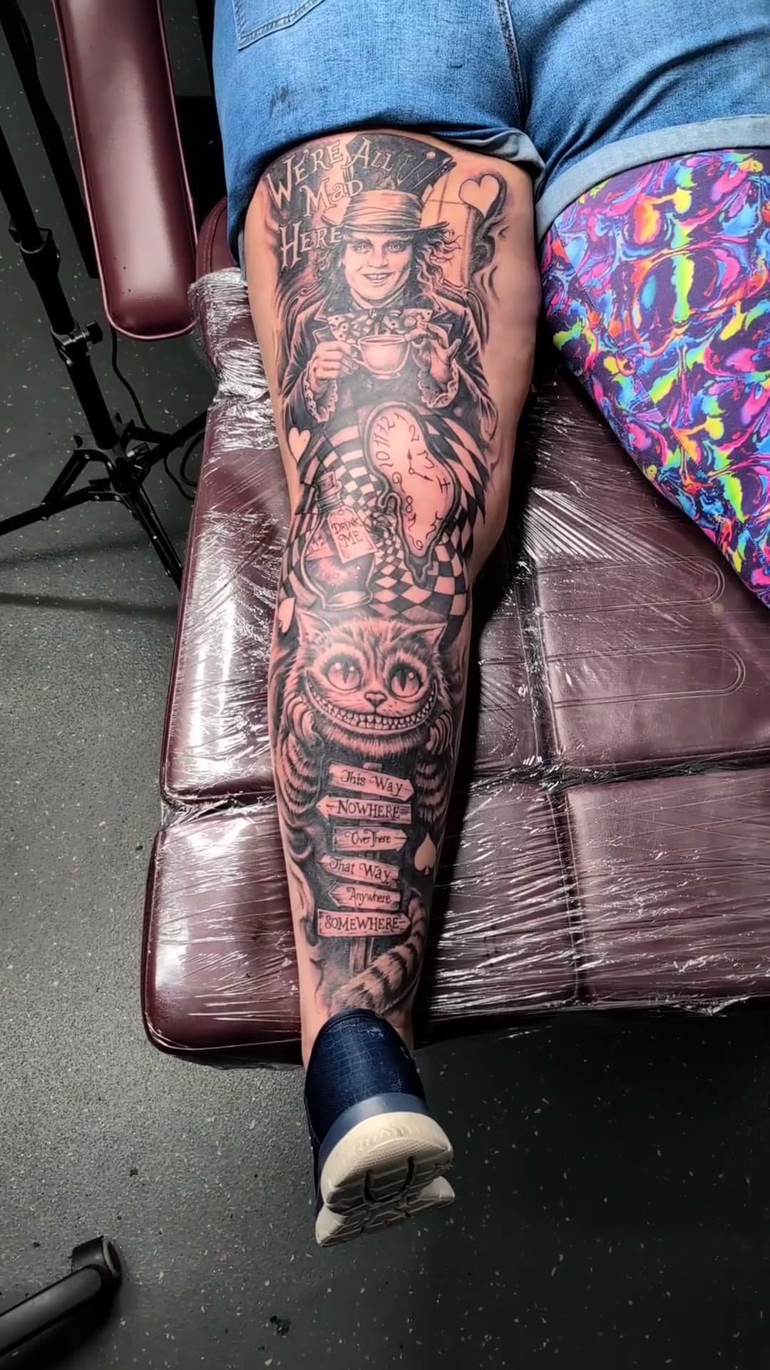 Alice in Wonderland leg sleeve tattoo, stencil to reveal — cover photo