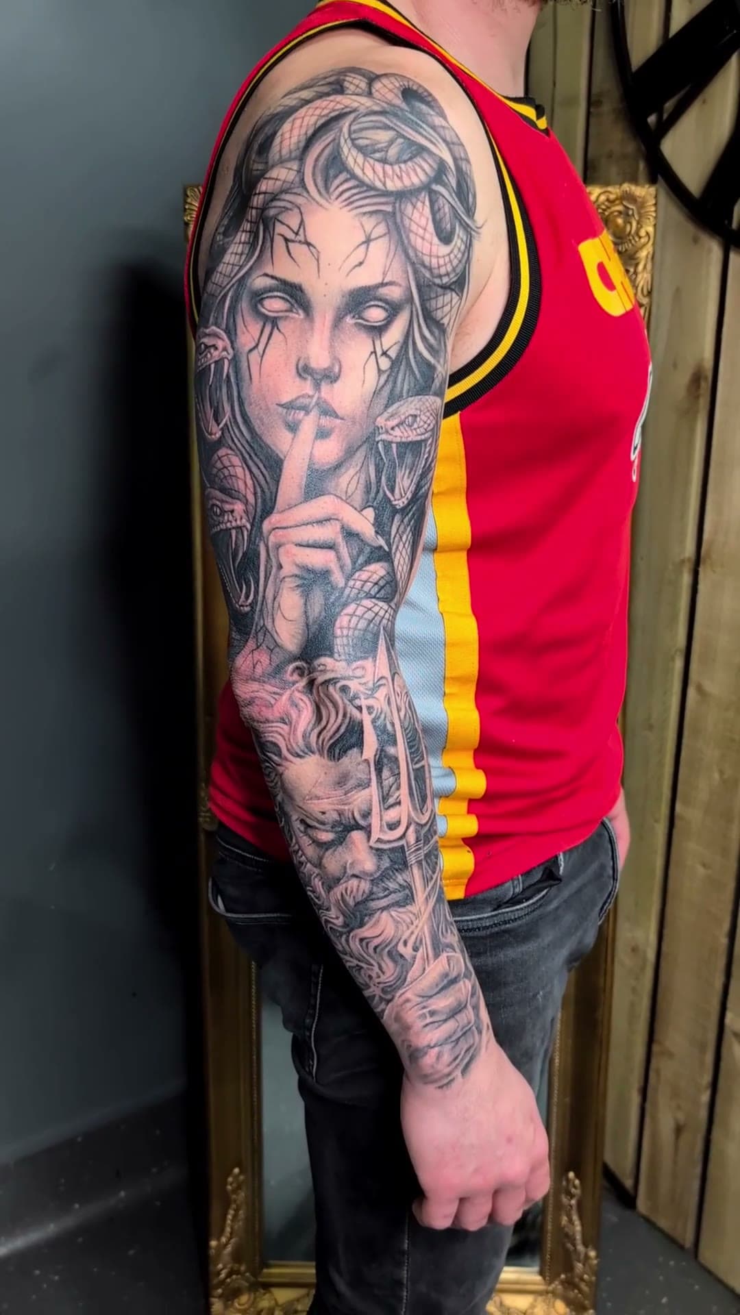 Medusa and Poseidon outer arm tattoo, fully healed — cover photo